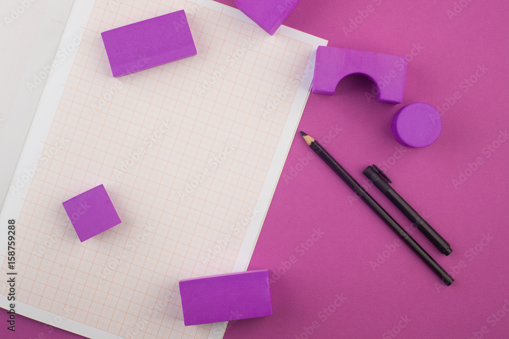 Workspace designer, architect, millimeter paper for drawings, pencil, geometric shapes on purple background, copy space Workspace designer, architect, millimeter paper for drawings, pencil, geometric shapes on purple background, copy space