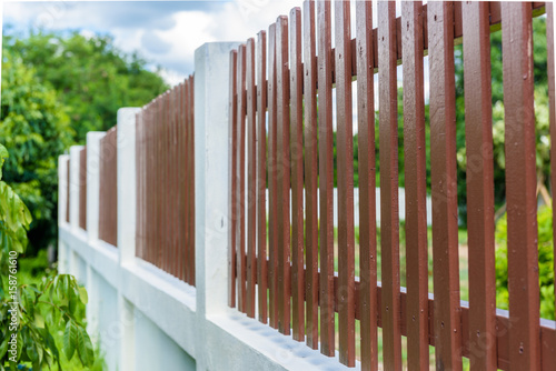 wood and metal fence of residential house