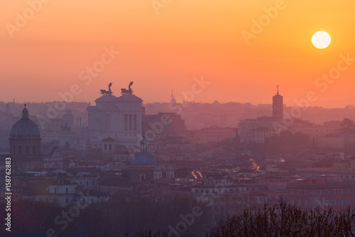 Cityscape of Rome, Italy, at sunset in autumn, a view from the Gianicolo (Janiculum) hill photo