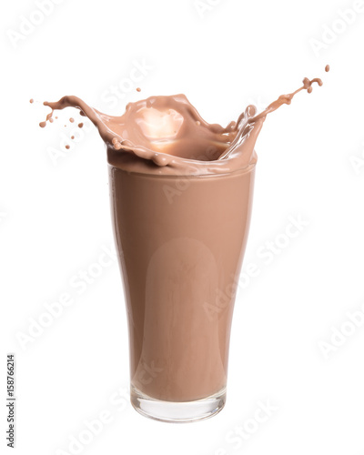 Chocolate milk splash out of glass., Isolated on white background.