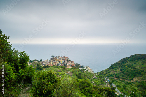 The small village of Corniglia  with its colorful houses surrounded by the vineyards  is one of the five town of the Cinque Terre in Liguria.