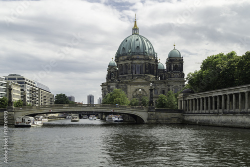  Side view of the Berlin Cathedral next to the river Spree and the Friedichsbrücke, Germany