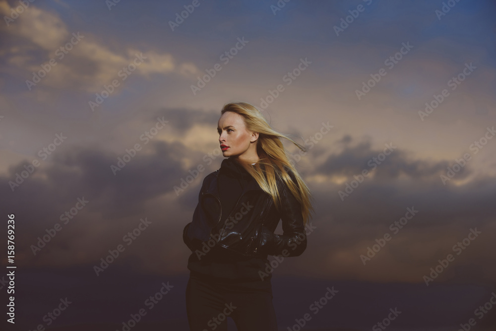 young woman on sky background, nature and fashion, business