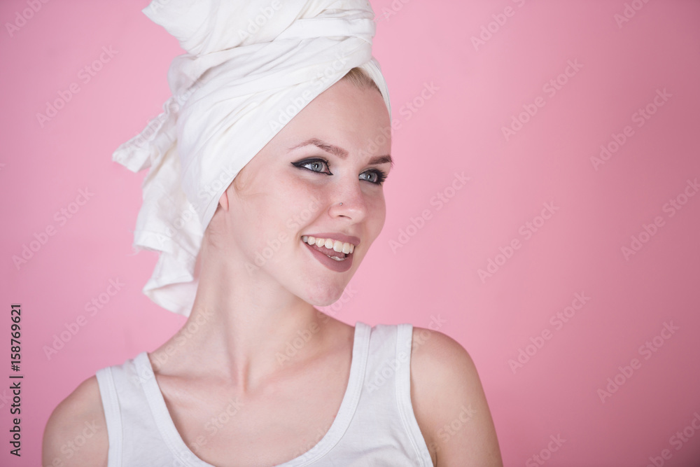 Smiling girl with healthy teeth and white towel on head Smiling girl with healthy teeth and white towel on head