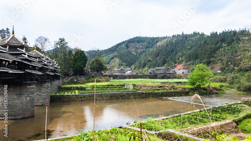 water canal and Chengyang Wind and Rain Bridge photo