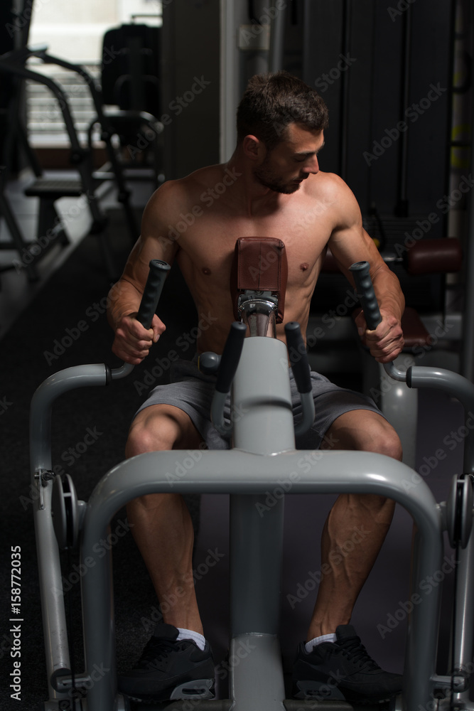 Man Doing Heavy Weight Exercise For Back Man Doing Heavy Weight Exercise For Back