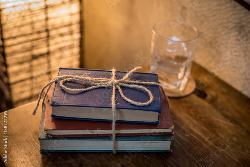 Stacked Books Tied with Rope 