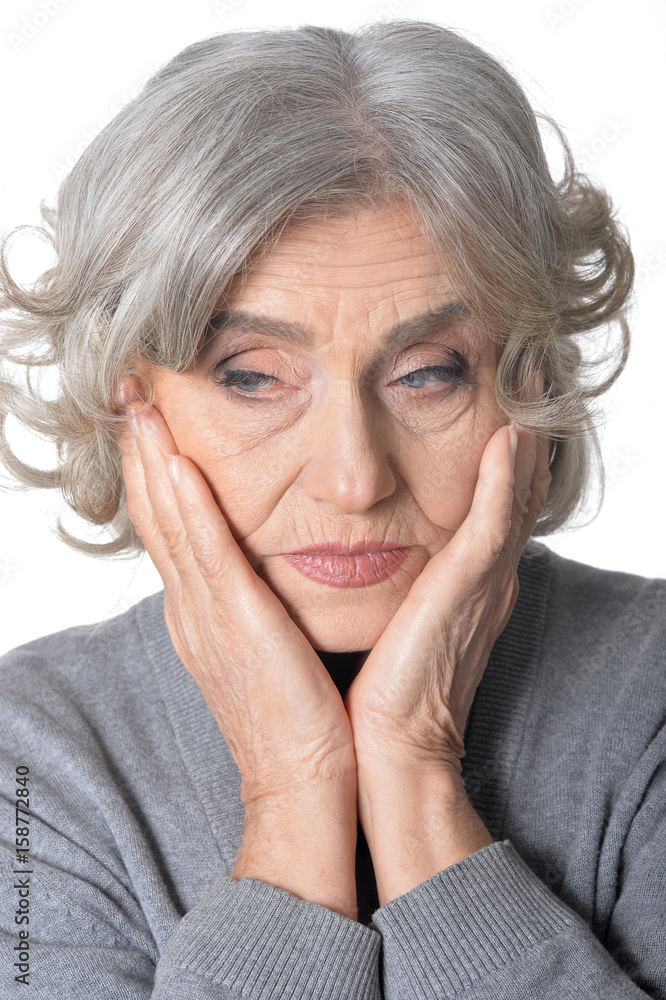 Beautiful sad elderly woman close-up Beautiful sad elderly woman close-up