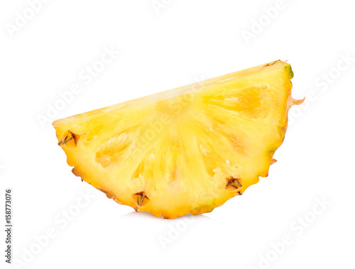 Slice of fresh pineapple fruit isolated on white background
