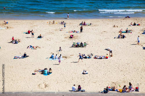 british seaside - summer holiday destination - top view of people on the beach in Bournemouth, Dorset, UK © Melinda Nagy