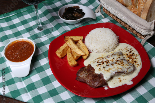 Italian dinner with breads, water and wine, table tidy