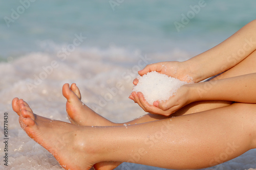 feet on the background of the sea, women's feet