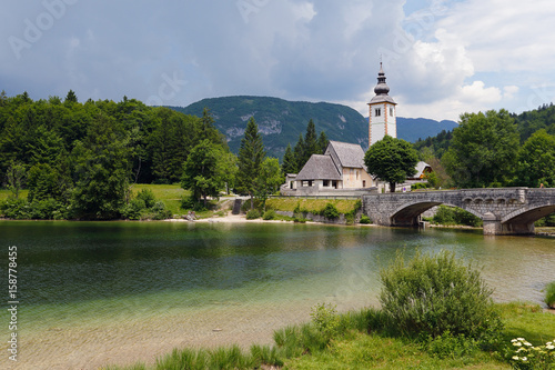 Beautiful church and bridge in Bohinj lake