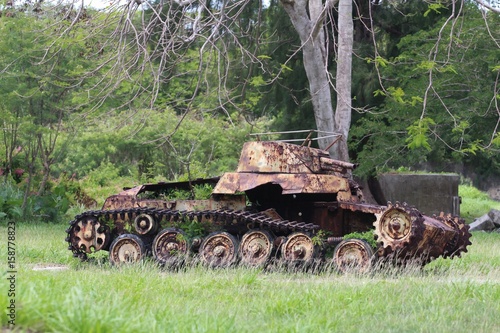 Old Japanese tanker at Aslito Airfield, Saipan World War 11 relics of a Japanese tanker in Aslito Airfield, near the Saipan International Airport photo