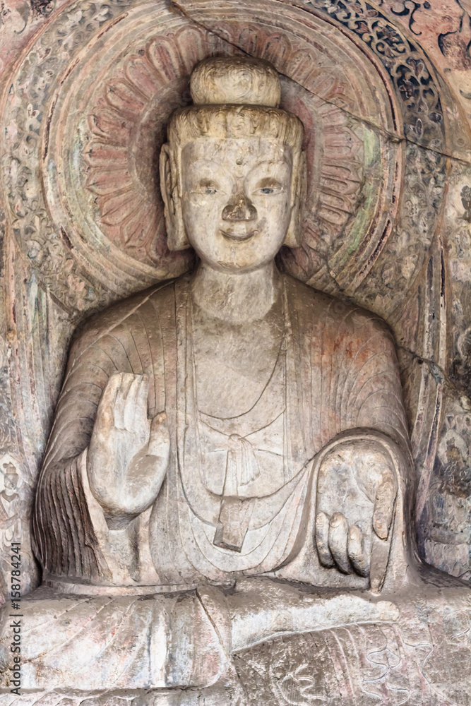 Sakyamuni statue in Middle Binyang Cave
