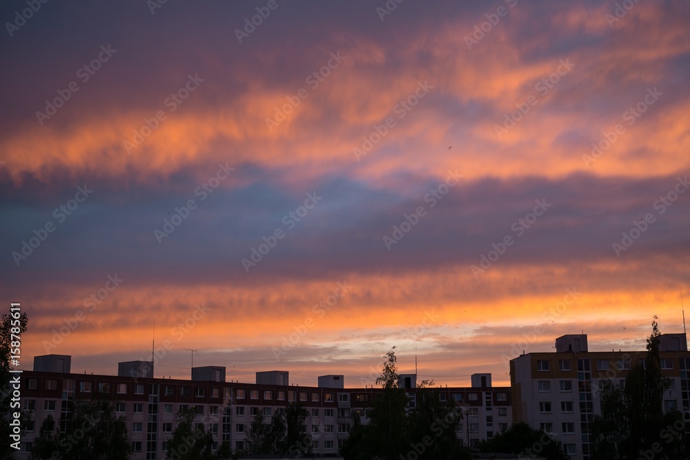 Sunrise and sunset over the buildings in the Zilina city. Slovakia