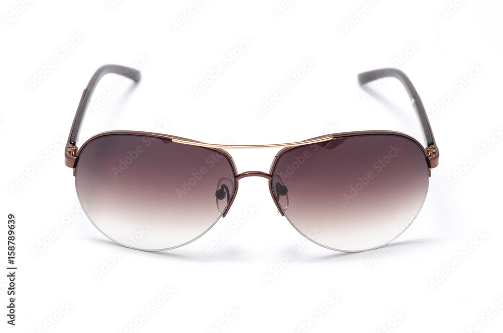 Sunglasses in an iron frame with brown glass isolated on white Sunglasses in an iron frame with brown glass isolated on white
