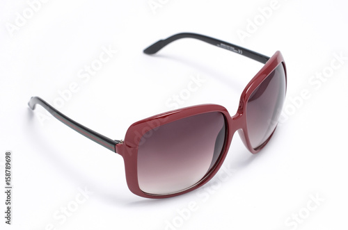 womans sunglasses in wide frame and brown glass isolated