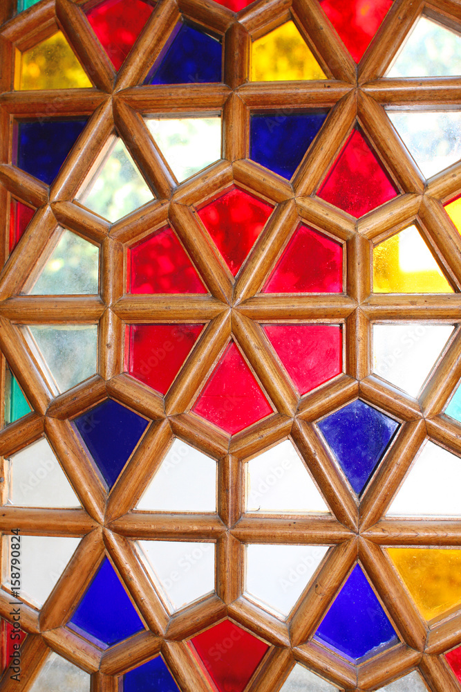 Wallpaper with repeating pattern. Stained glass