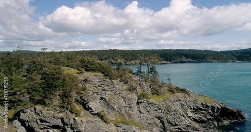 Pacific Ocean Island Trees Fly Over Looking Out on Strait of Juan de Fuca photo