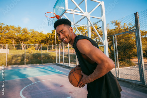Man playing basketball, street ball, man playing, sport competitions, afro, outdoor portrait,sport games,handsome black man,pretty,man holding ball