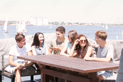 Happy friends in cafe