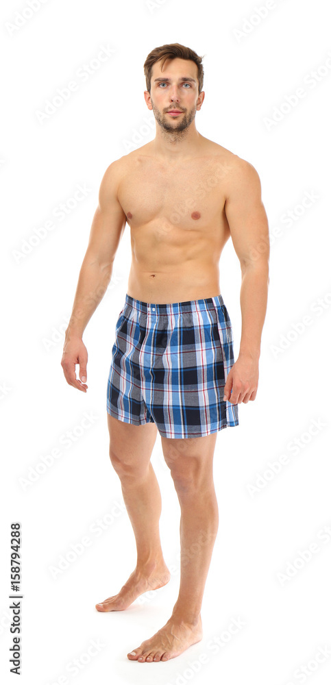 Fototapeta premium Man in blue boxers on white background