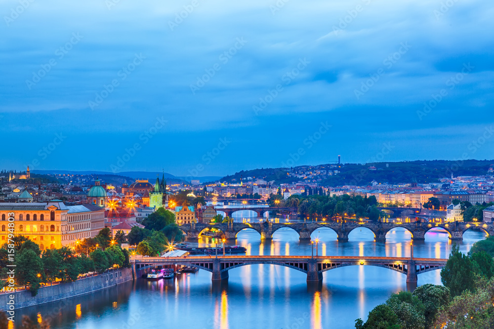 Prague at twilight blue hour, view of Bridges on Vltava
