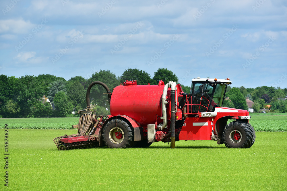 Naklejka premium Injection of liquid manure with a slurryinjector to reduce emissions of ammonia, phosphate, nitrate and greenhouse gases.