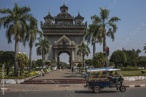 Patuxai literally meaning Victory Gate or Gate of Triumph, formerly the Anousavary or Anosavari Monument, known by the French as (Monument Aux Morts) is a war monument in the centre of Vientiane, Laos photo