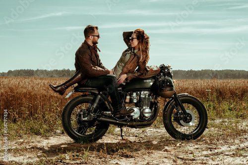 Fototapeta Couple and cafe racer motorcycle