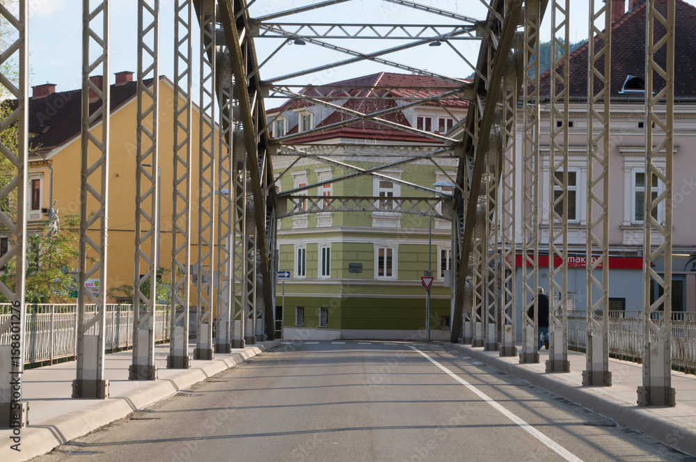 Bridge with beautiful old town buildings at its end