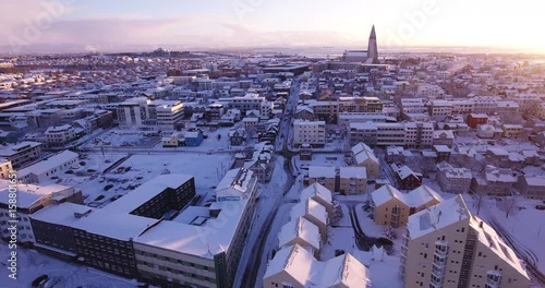 Tilt up aerial, urban area in Iceland