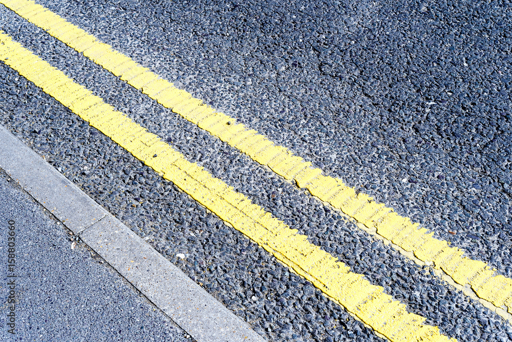Fototapeta premium Double Yellow Painted No Parking Traffic Lines