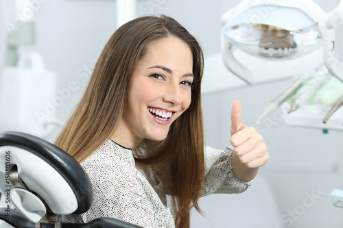 Dentist patient satisfied after treatment