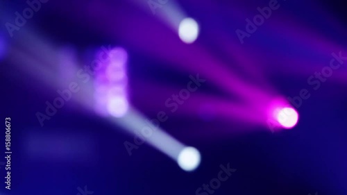 Colorful laser lights on the stage. Professional color lighting and sound show effects. Background of concert light flashes