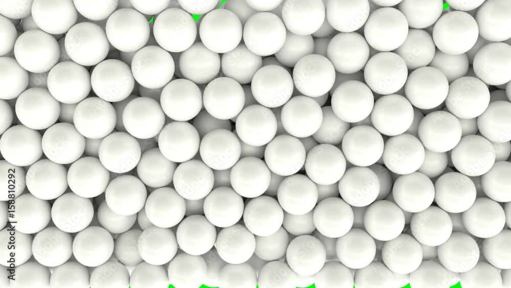 Falling and bouncing a great amount of white plain Ping-pong balls against green background. Top view shot. Falling and bouncing a great amount of white plain Ping-pong balls against green background. Top view shot.