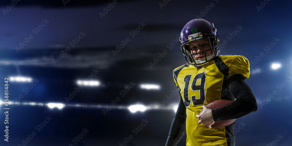 Naklejka premium Football player at stadium. Mixed media