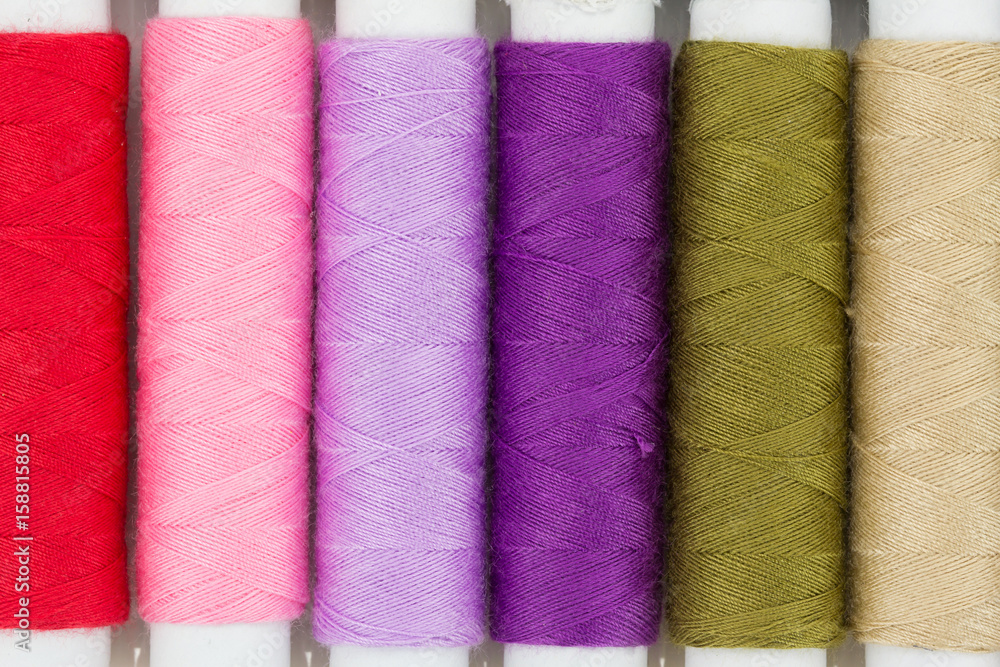 Colorful yarns spool isolated on white Colorful yarns spool isolated on white