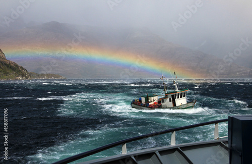 Fishing boat got rescued after struggeling for life in a storm, fiord in Bernardo O'Higgins Nationa Park, Chile photo