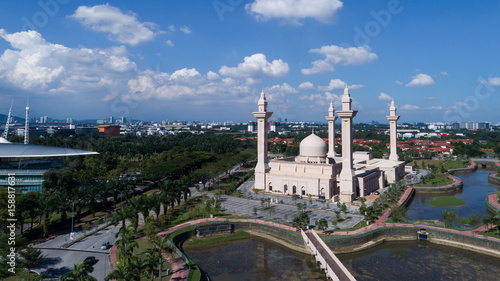 Aerial view of Masjid Diraja Tengku Ampuan Jemaah, Bukit Jelutong Shah Alam during sunny cloudy day.