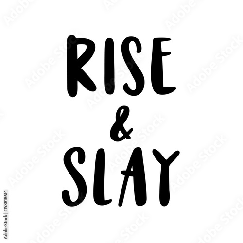  The calligraphic quote  "Rise & slay" handwritten of black ink on a white background.