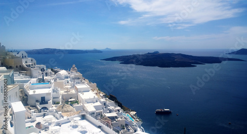 Panoramic views of the coast of Fira in Santorini island on a hot summer day