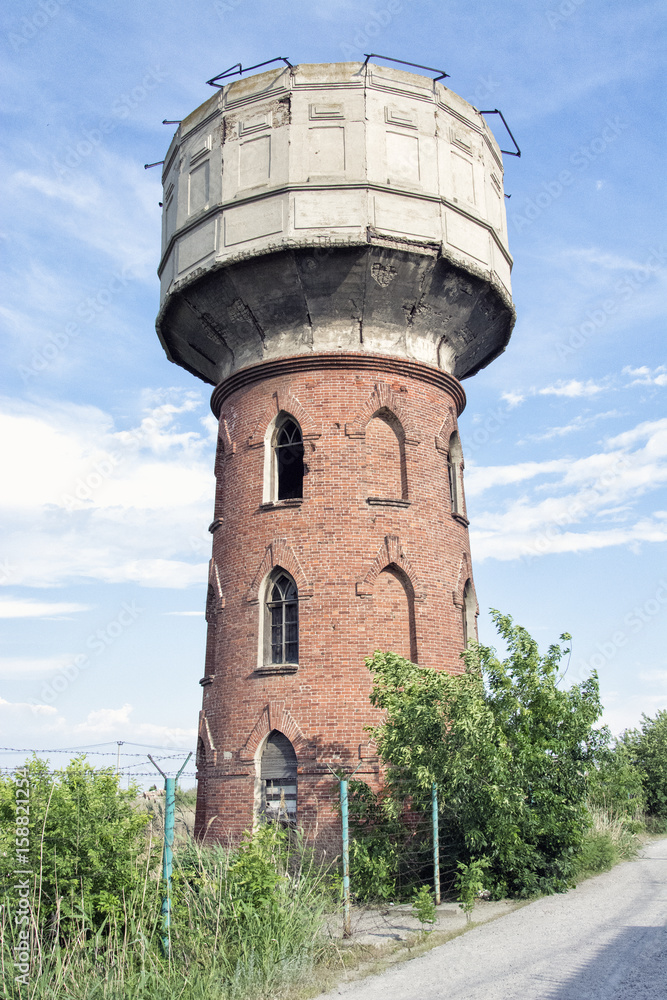the old water tower from a close distance the old water tower from a close distance