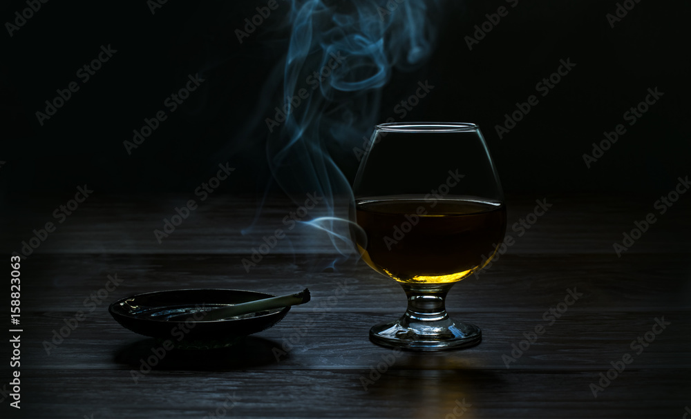 Fototapeta premium Pleasant evening! Cognac and cigarette