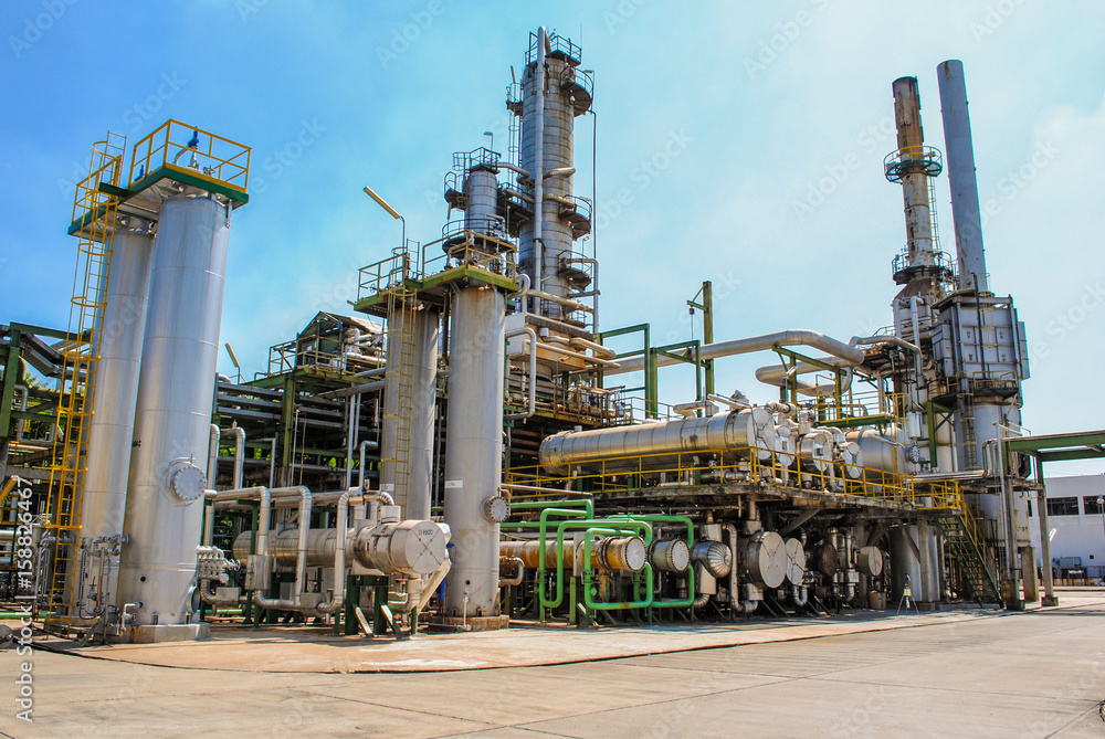Industrial view at oil refinery day Industrial view at oil refinery day