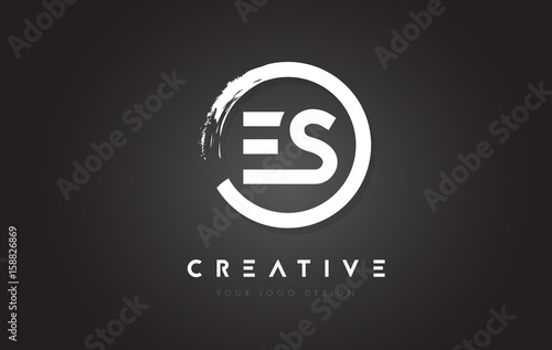 ES Circular Letter Logo with Circle Brush Design and Black Background. photo