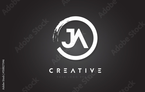 JA Circular Letter Logo with Circle Brush Design and Black Background. photo