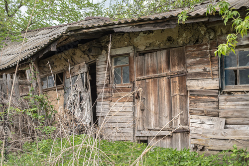 Old abandoned rotting house in the village