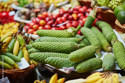 Exotic fruit of monstera deliciosa on market Mercado dos Lavradores, Madeira island, Portugal photo